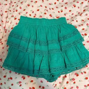 green altar’d state skirt with built in shorts
